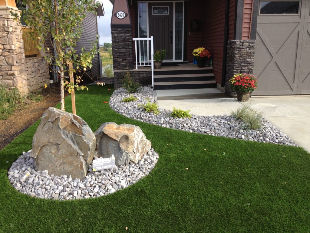 Tulsa Lawn Care landscaping tulsa sprinker french drain rocks